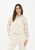 CALVIN KLEIN JEANS Felpa con zip beige da donna rifinita da logo e bande a contrasto LV047E226GYAC . CALVIN KLEIN JEANS 