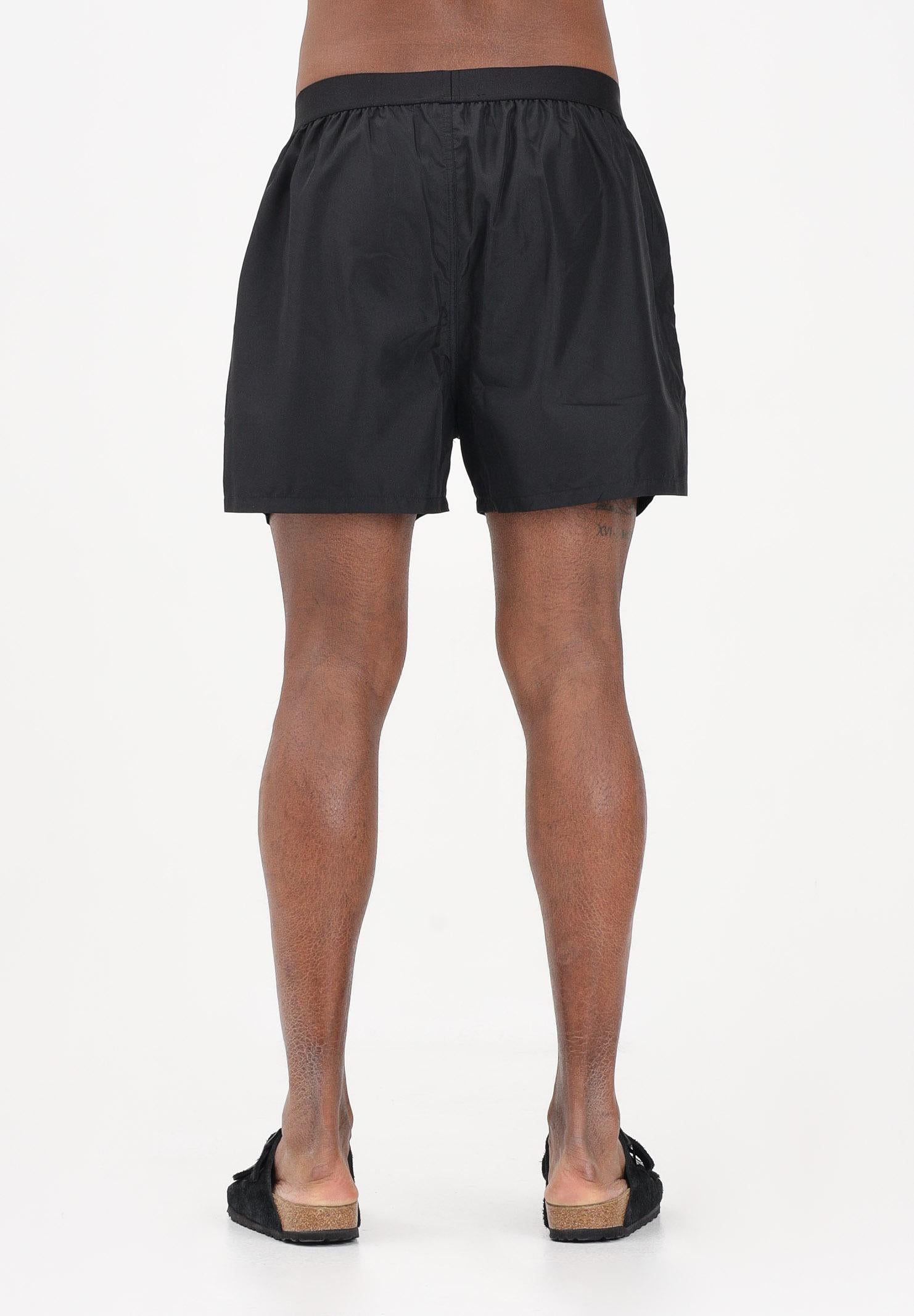 DSQUARED2 Shorts mare nero da uomo con logo in vita D7B626560 010 DSQUARED2 