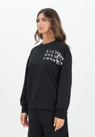 MAISON MARGIELA Felpa girocollo nera per donna, ragazzi e bambini con il logo Hand Written M60896MM02X M6900 MAISON MARGIELA 