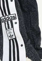 ADIDAS ORIGINALS Pantalone sportivo AOP ADI-BREAK nero da donna KD2830 . ADIDAS ORIGINALS 