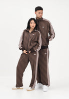 ADIDAS ORIGINALS Pantalone sportivo FIREBIRD LOOSE MONOGRAM marrone per uomo e donna KE1678 . ADIDAS ORIGINALS 