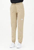 THE NORTH FACE Pantalone antivento Mountain Athletics beige da donna NF0A8BGPLK51  THE NORTH FACE 