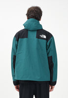 THE NORTH FACE Giacca a vento Mountain Mono verde da uomo NF0A88XF5861 . THE NORTH FACE 