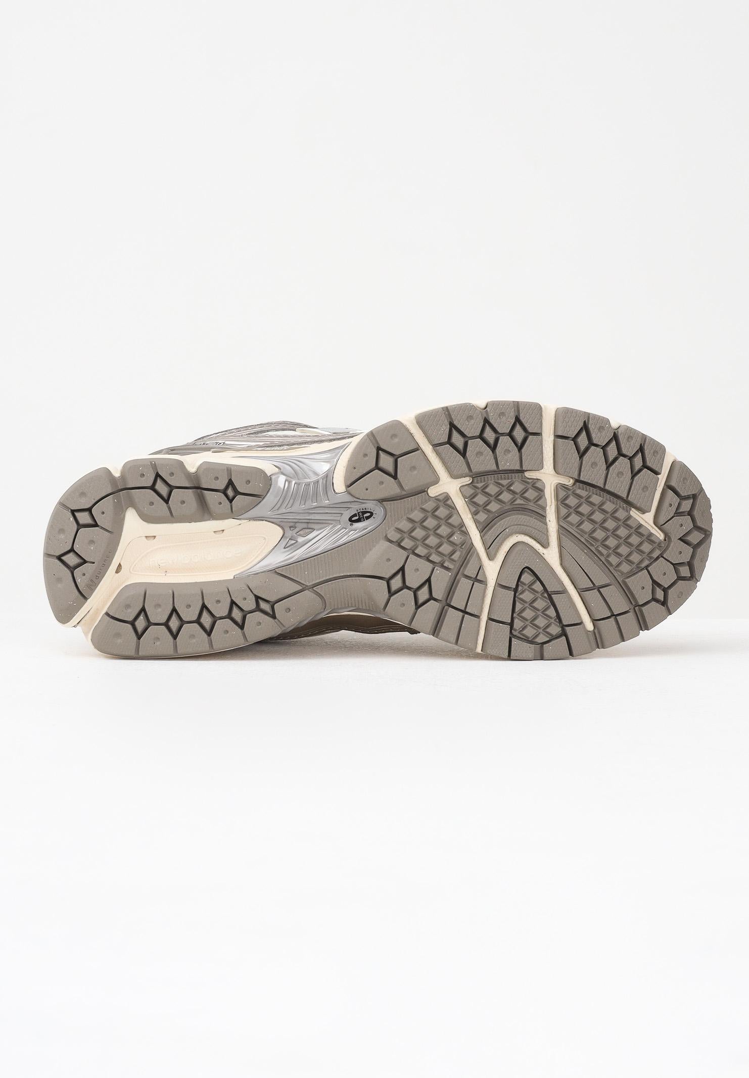 NEW BALANCE Sneakers 1906R panna e argento per uomo e donna U1906RCN . NEW BALANCE 