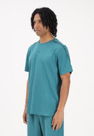 PUMA T-shirt a manica corta Essentials Tape turchese da uomo 691693 41 PUMA 
