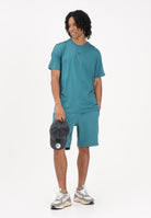 PUMA T-shirt a manica corta Essentials Tape turchese da uomo 691693 41 PUMA 