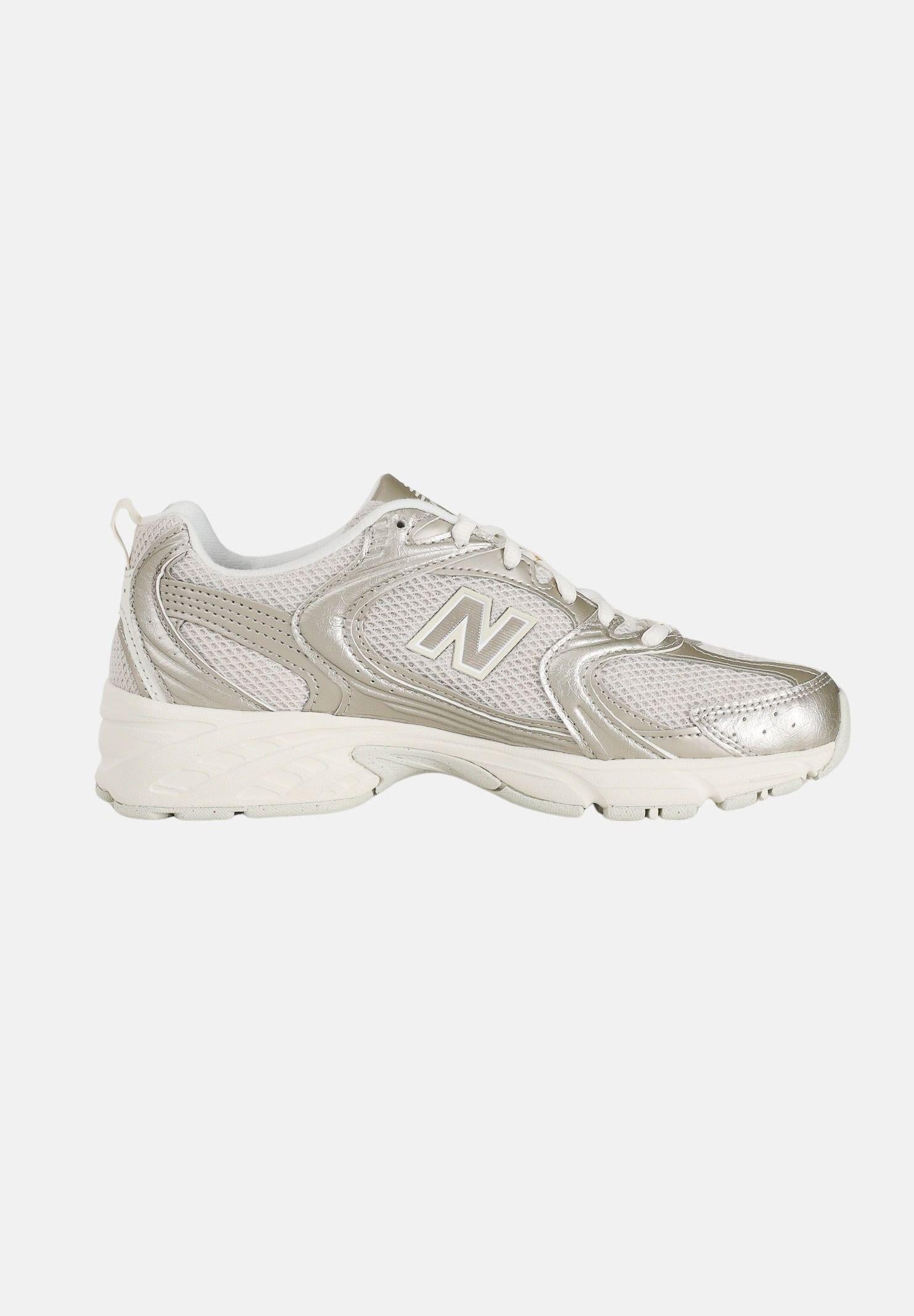 NEW BALANCE Sneakers 530 bianca e oro per uomo e donna U5301Z0 . NEW BALANCE 