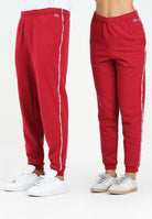 LACOSTE Pantalone sportivo bordeaux per uomo e donna con bande logate XH9803 476 LACOSTE 