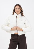 TOMMY JEANS Piumino panna da donna con logo DW0DW21620YBH  TOMMY JEANS 