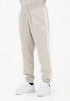ADIDAS PERFORMANCE Pantalone sportivo ESSENTIALS THREE STRIPES FRENCH TERRY beige da uomo JE6353 . ADIDAS PERFORMANCE 