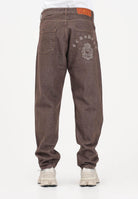 GCDS Jeans marrone da uomo con stampa sul retro C1MWQI191D087 388B GCDS 