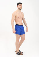 DSQUARED2 Shorts mare blu da uomo con fascia elastica logata D7B646040 432 DSQUARED2 