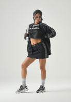 ADIDAS ORIGINALS  gonna corta Mid Rise Denim Skirt True Black Denim nera donna KQ6485 . ADIDAS ORIGINALS 