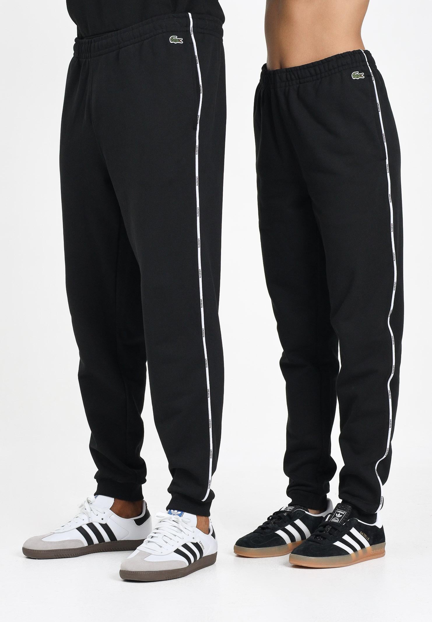 LACOSTE Pantalone sportivo nero per uomo e donna con riga logata XH9803 031 LACOSTE 