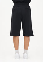 GCDS Shorts sportivo nero per uomo e donna con bande laterali C1MEQL214F004 999B GCDS 