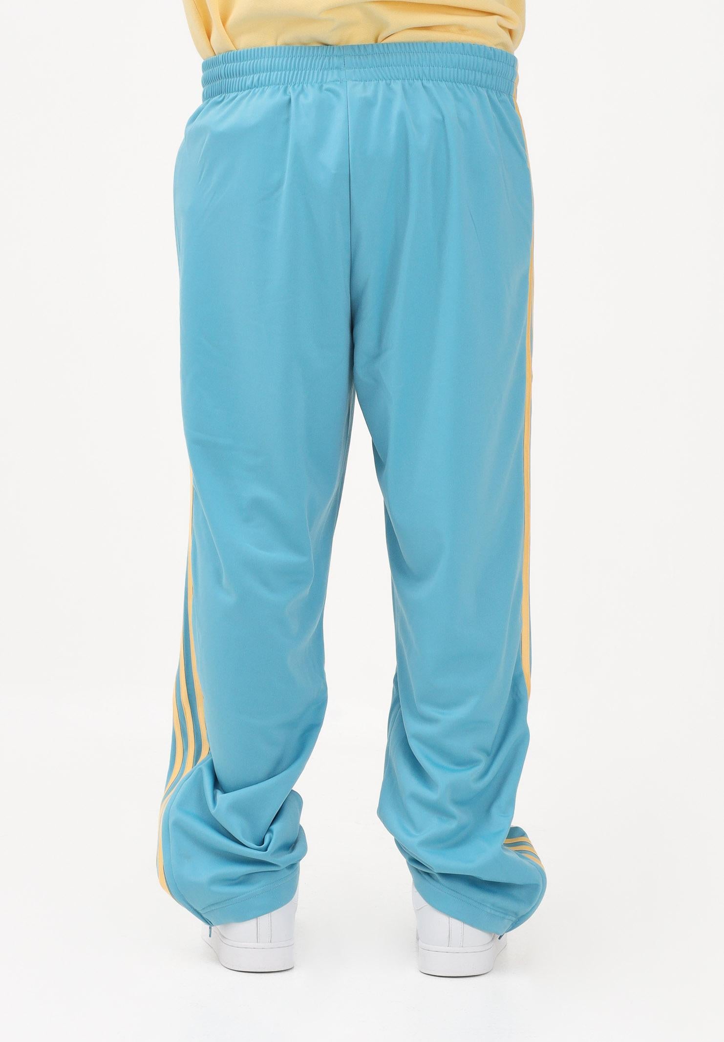 ADIDAS ORIGINALS Pantalone sportivo FIREBIRD azzurro e giallo da uomo KE1648 . ADIDAS ORIGINALS 