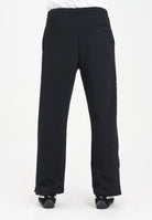 GCDS Pantalone sportivo nero per uomo e donna con lavorazione jacquard del logo B2CM3010TQ6 99 GCDS 