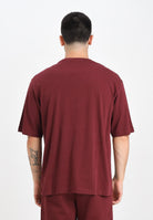 PUMA T-shirt a manica corta WARDROBE ESS bordeaux da uomo 629645 96 PUMA 