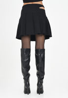 VERSACE JEANS COUTURE Gonna corta nera da donna con fibbie Baroque e dettaglio cut-out 79HAE801N0356 899 VERSACE JEANS COUTURE 