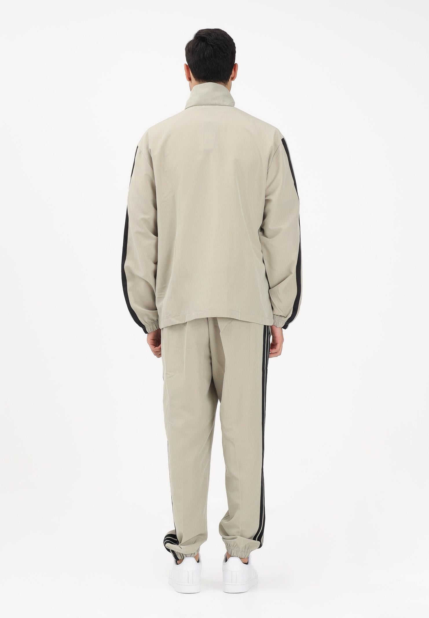 ADIDAS PERFORMANCE Tuta 3 STRIPES WOVEN sabbia da uomo JY7720 . ADIDAS PERFORMANCE 