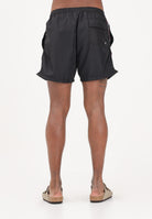GCDS Shorts mare nero da uomo con bande logate a contrasto C1MEQS244T016 999B GCDS 