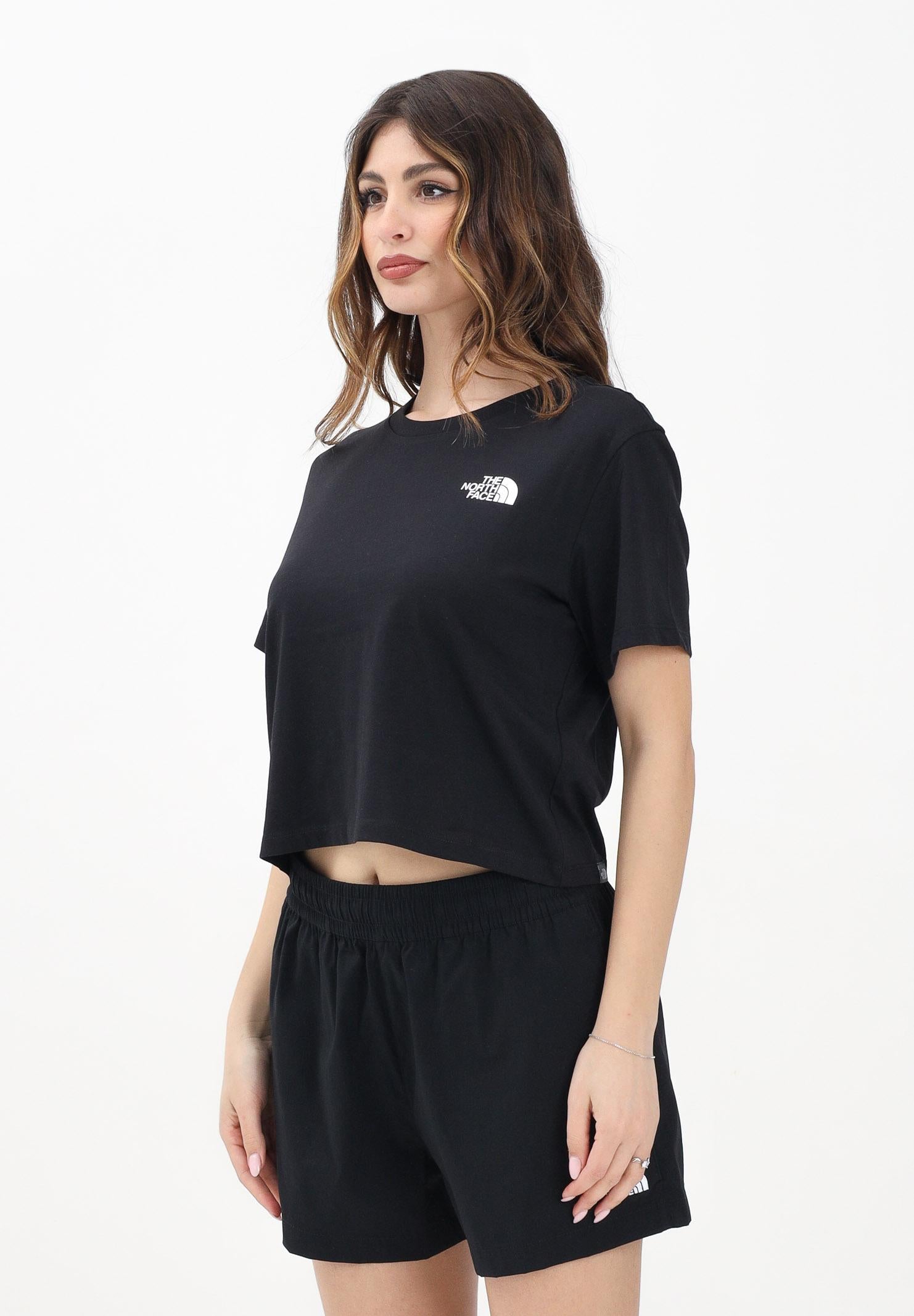 THE NORTH FACE T-shirt a manica corta Cropped nera da donna NF0A87U4JK31 . THE NORTH FACE 