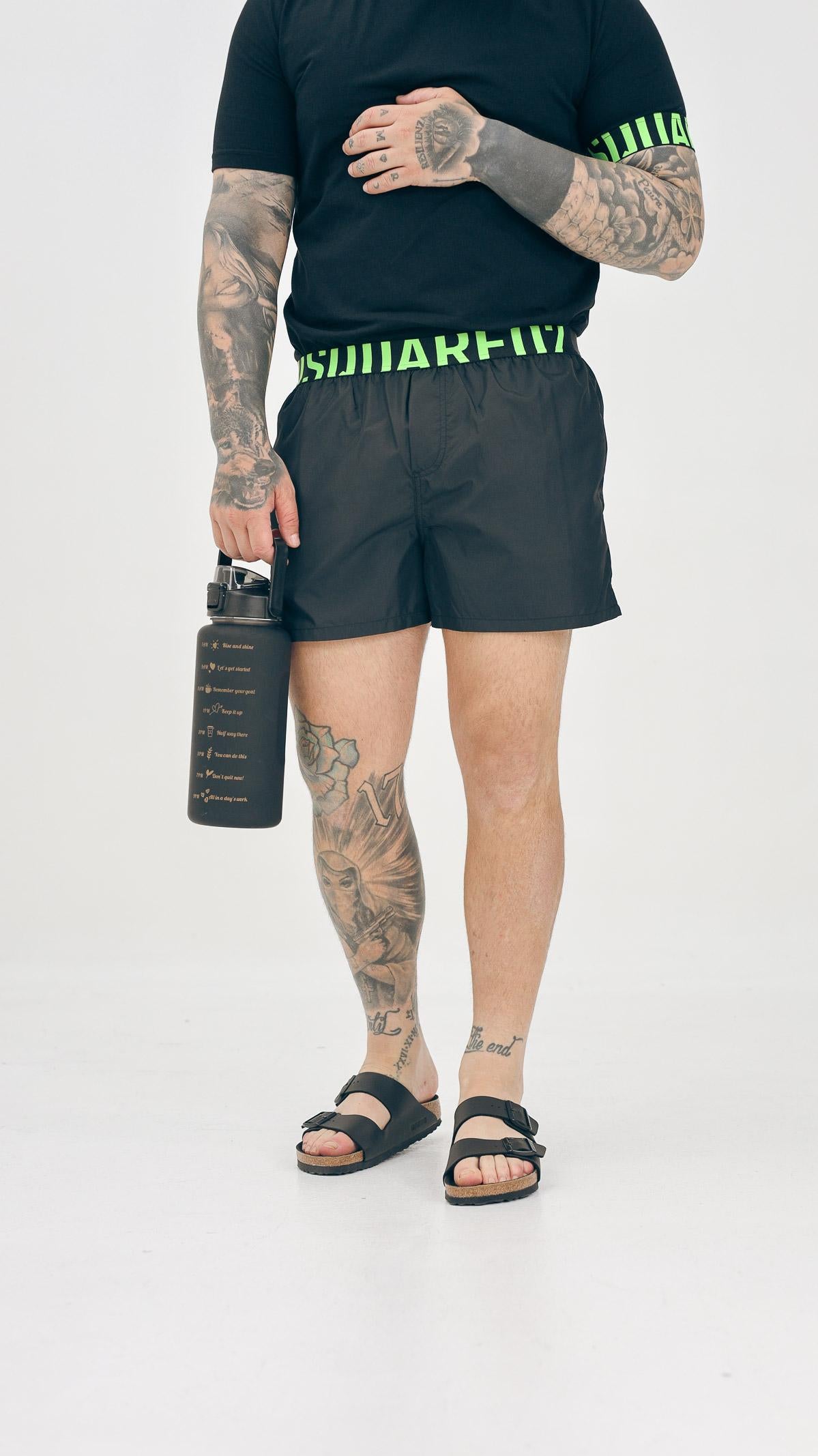 DSQUARED2 Shorts mare nero da uomo con fascia elastica logata D7B646040 004 DSQUARED2 
