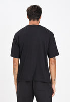 PUMA T-shirt a manica corta WARDROBE ESS nera da uomo 629645 01 PUMA 