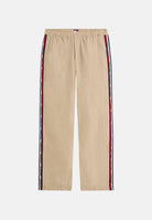 TOMMY JEANS Pantaloni Jaimie Relaxed Global Stripe Tape Trousers gentle gold beige, colore basico beige, uomo DM0DM23123 AB9 TOMMY JEANS 