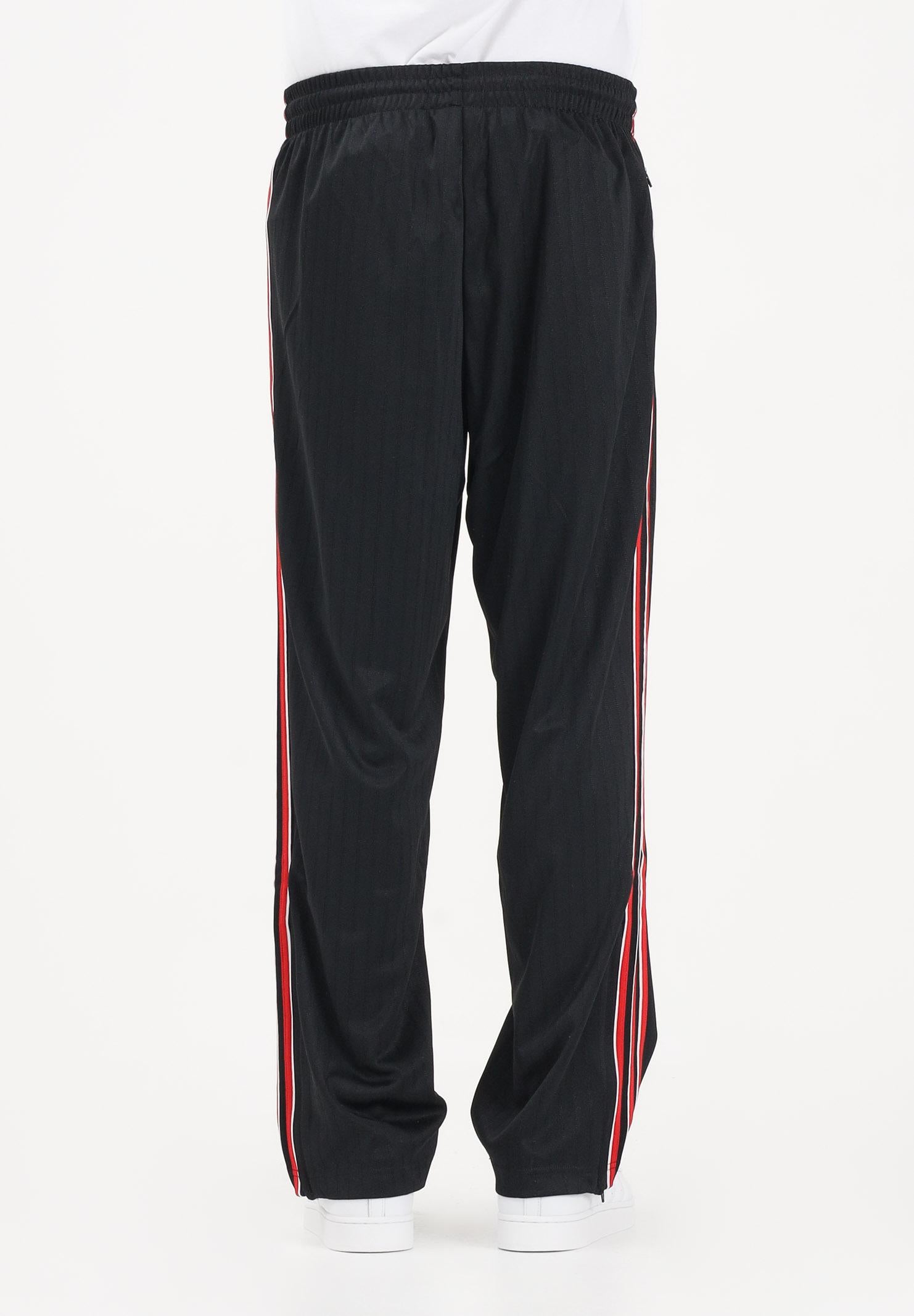 ADIDAS ORIGINALS Pantalone sportivo Firebird nero e rosso da uomo KE3457 . ADIDAS ORIGINALS 