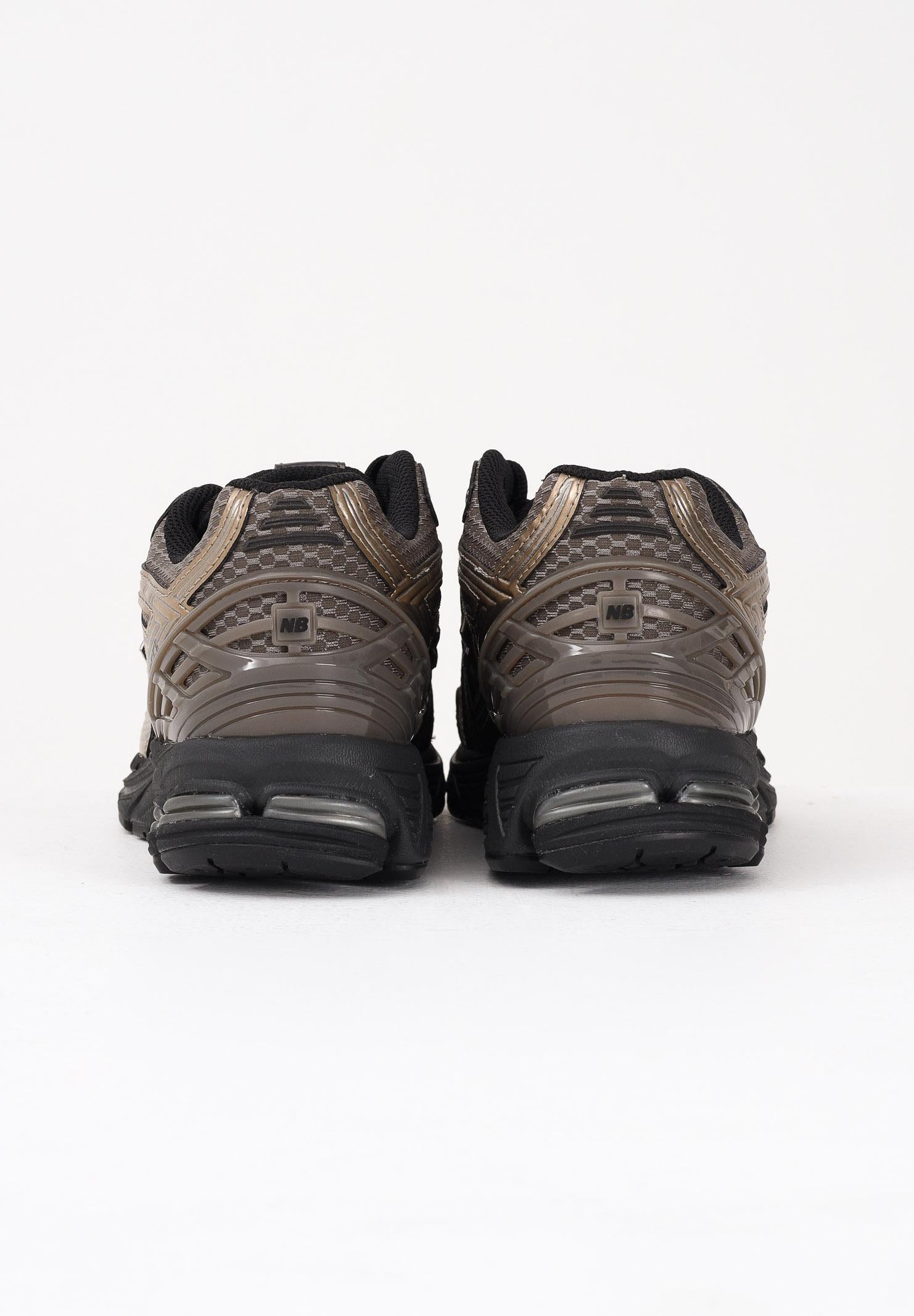 NEW BALANCE Sneakers 1906R nere, beige e oro da uomo U1906RCJ . NEW BALANCE 