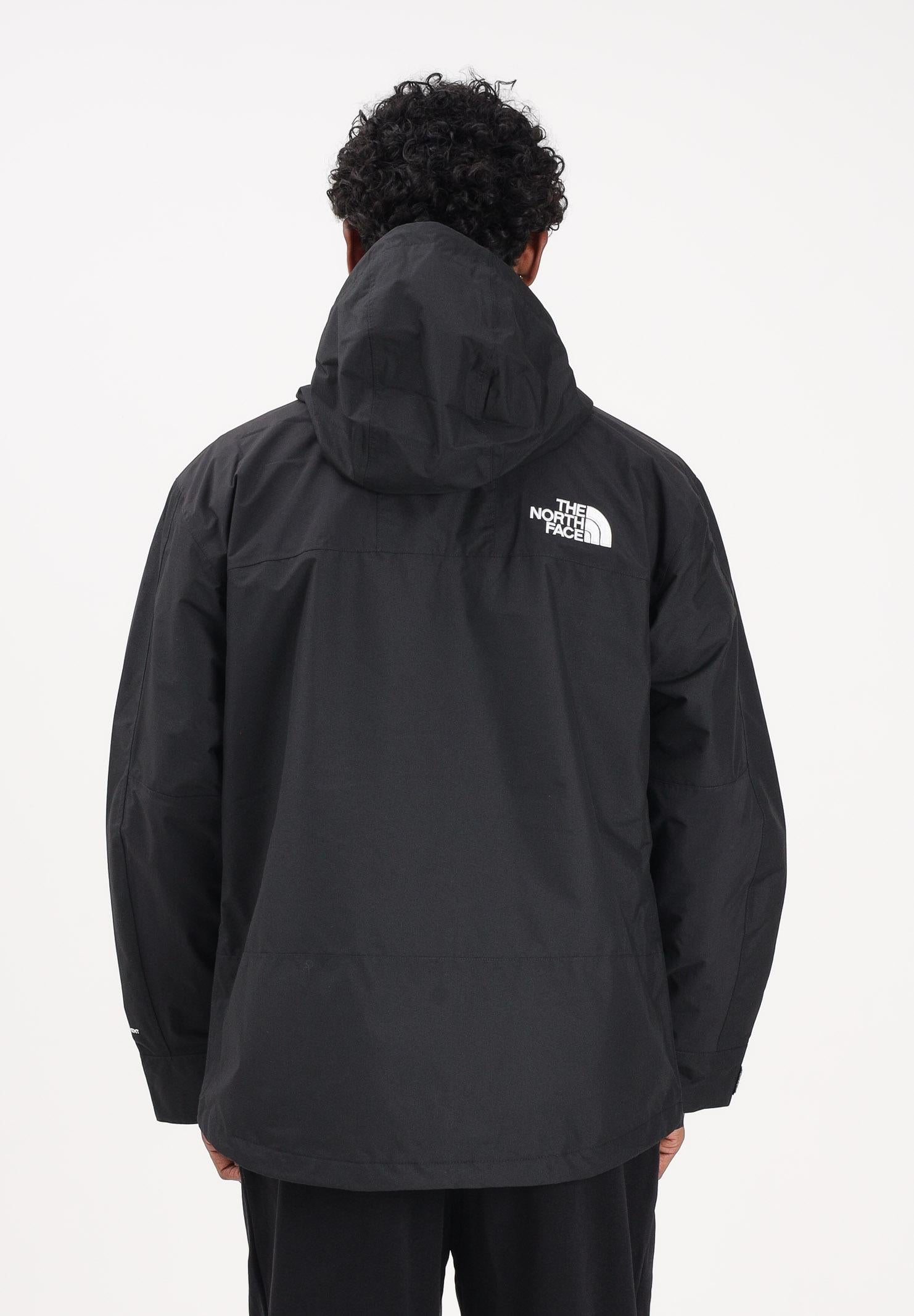 THE NORTH FACE Giacca a vento Reign On nera da uomo NF0A8B5GJK31 . THE NORTH FACE 