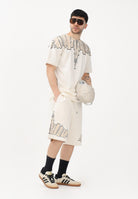 MARCELO BURLON COUNTY OF MILAN Shorts sportivo panna da uomo con stampa S6CMMABE018 412 MARCELO BURLON COUNTY OF MILAN 