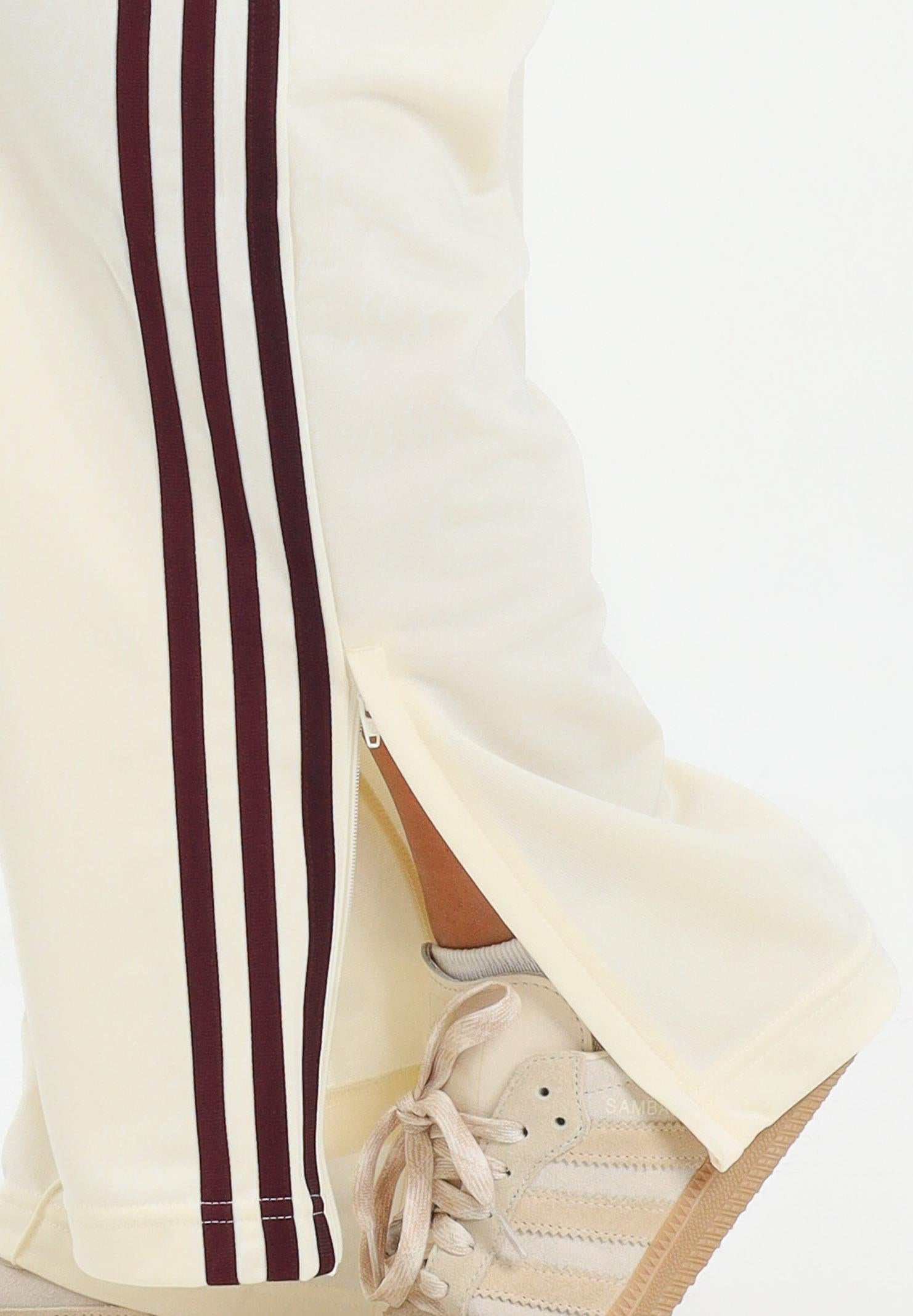 ADIDAS ORIGINALS Pantalone sportivo adicolor Classic Firebird Loose panna da donna KA7744 . ADIDAS ORIGINALS 