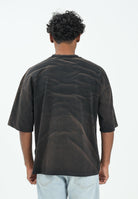 GCDS T-shirt a manica corta nera per uomo e donna con effetto lavato e stampa B2CM2315JF1 99 GCDS 