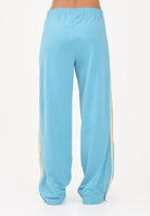 ADIDAS ORIGINALS Pantalone sportivo FIREBIRD azzurro e giallo da donna KT4628 . ADIDAS ORIGINALS 