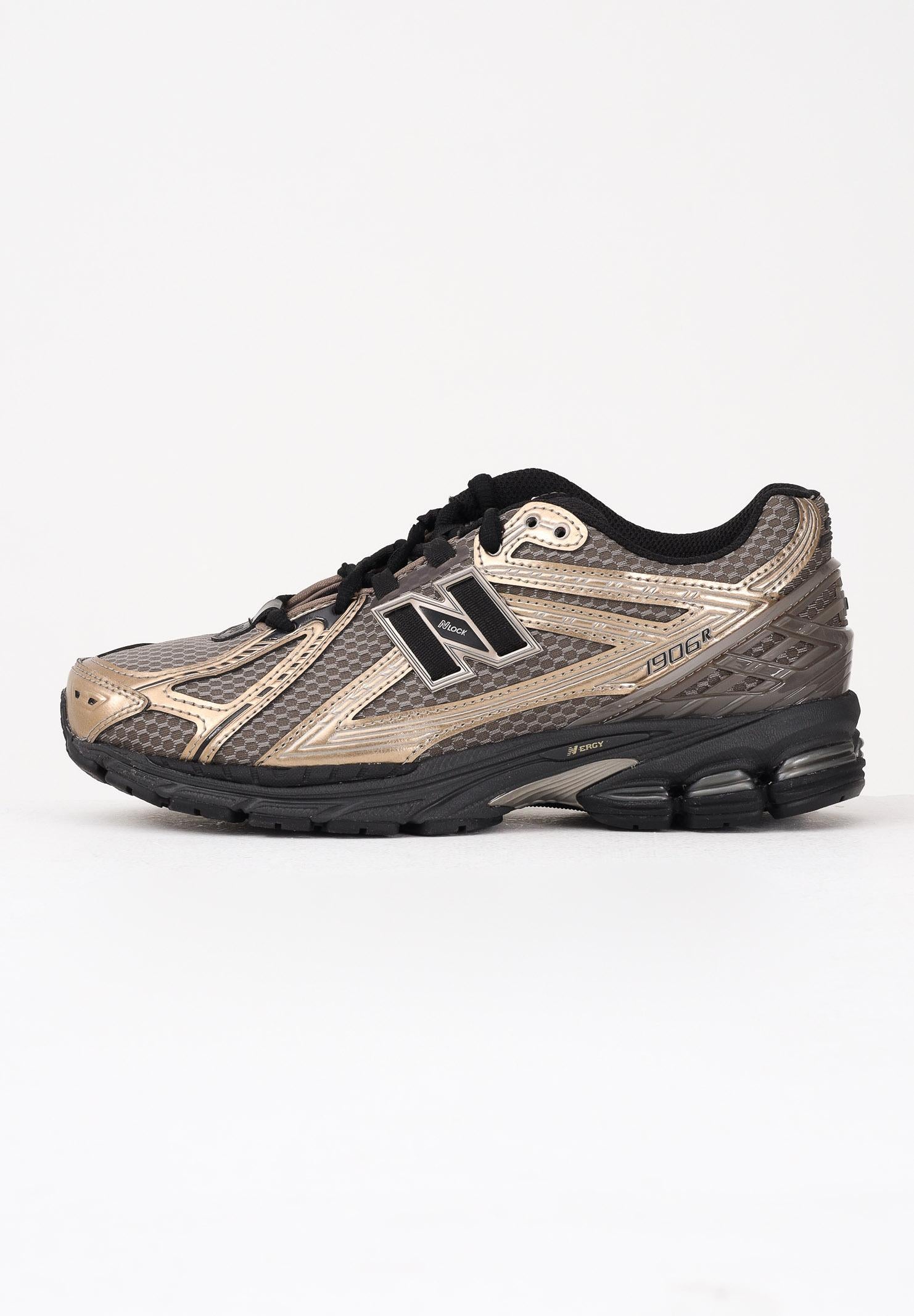 NEW BALANCE Sneakers 1906R nere, beige e oro da uomo U1906RCJ . NEW BALANCE 