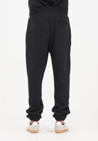 GCDS Pantalone sportivo nero per uomo e donna con logo impresso B2EM3006JD1 99 GCDS 
