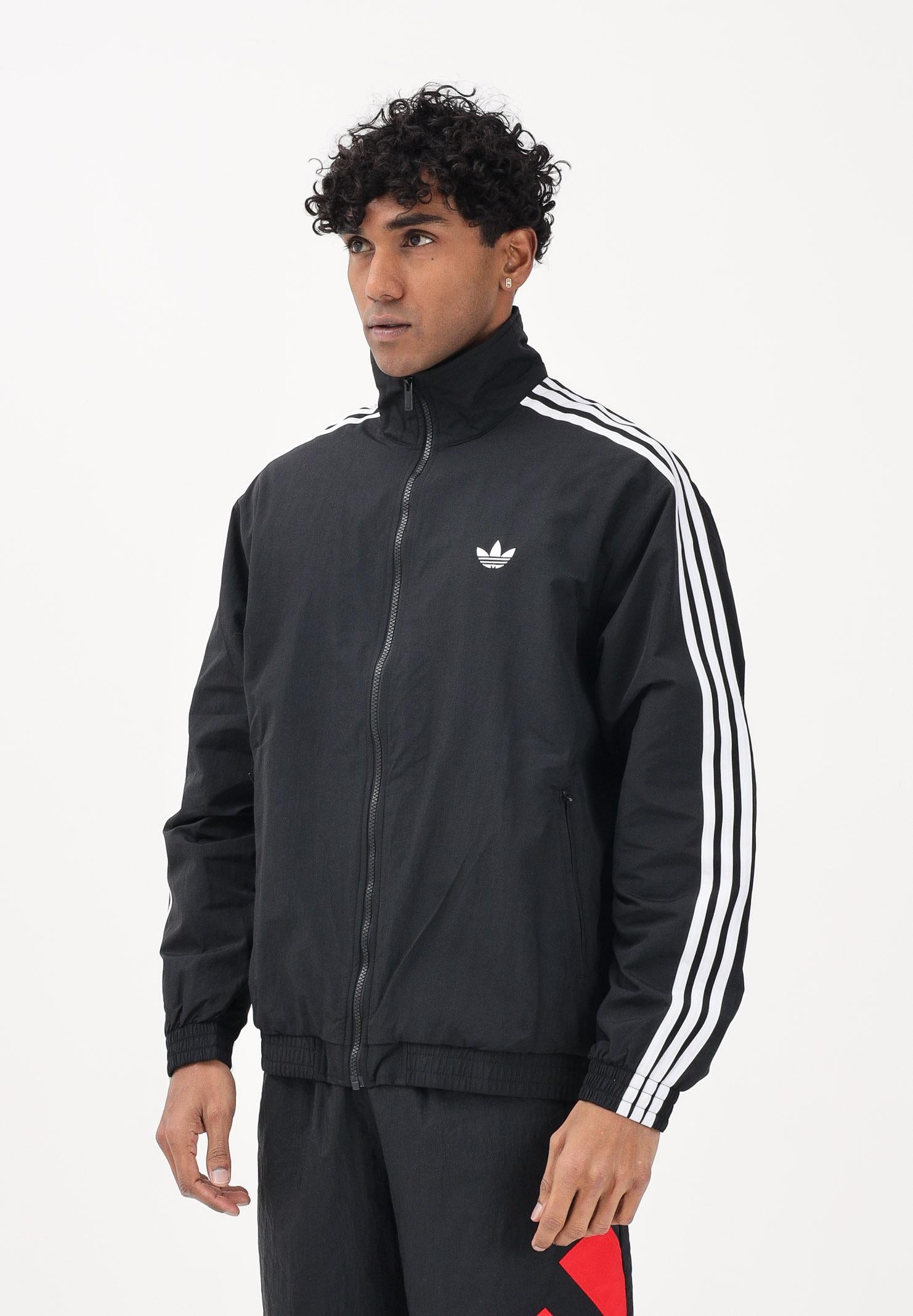 ADIDAS ORIGINALS Giacca a vento Firebird Woven nera da uomo KE1366 . ADIDAS ORIGINALS 