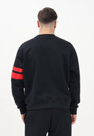 GCDS Felpa girocollo nera per uomo e donna con logo A2OM1510JI0 99 GCDS 