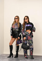 ADIDAS ORIGINALS Pantalone sportivo adidas X Jeremy Scott Pride AOP nero da donna JY2021 . ADIDAS ORIGINALS 