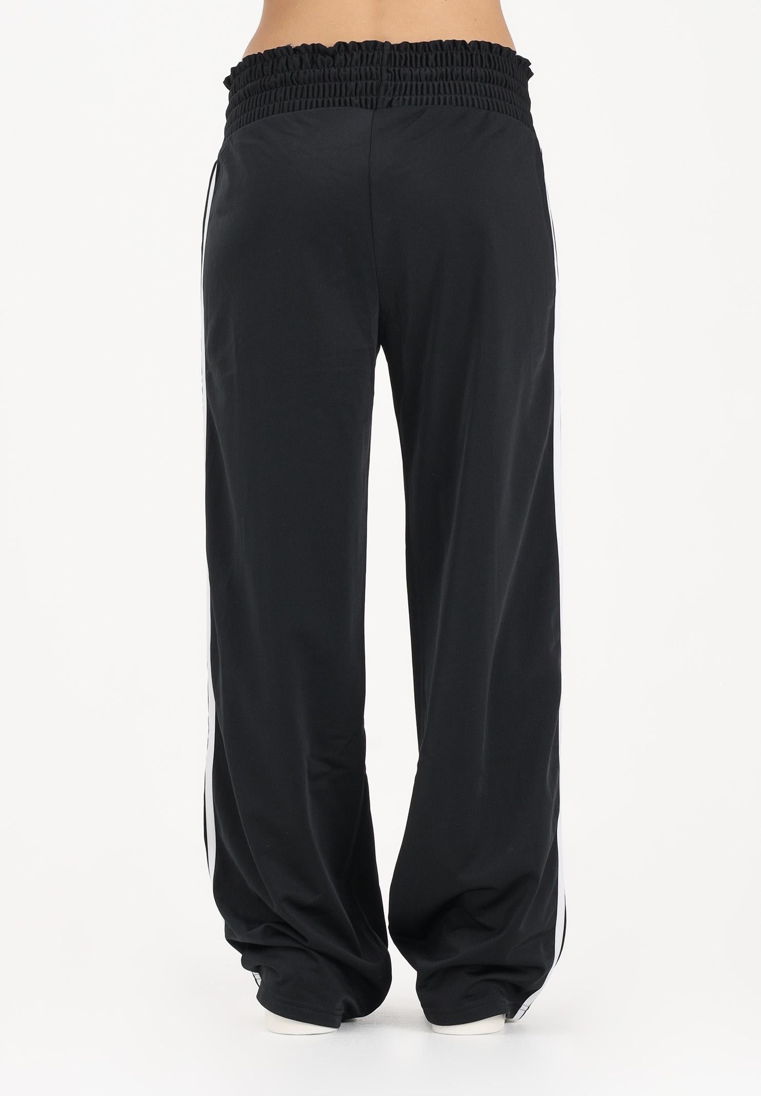 ADIDAS ORIGINALS Pantalone sportivo Smocked Firebird nero da donna KD0301 . ADIDAS ORIGINALS 