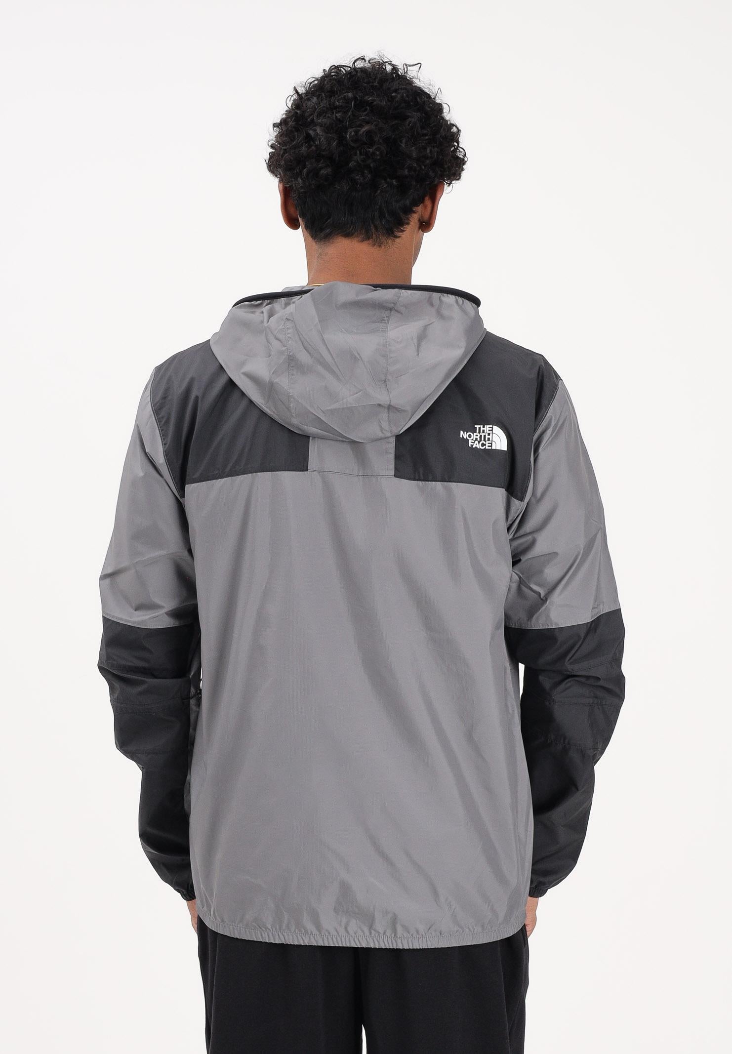 THE NORTH FACE Giacca a vento Seasonal Mountain Jacket grigia e nera da uomo NF0A5IG34GU1 . THE NORTH FACE 