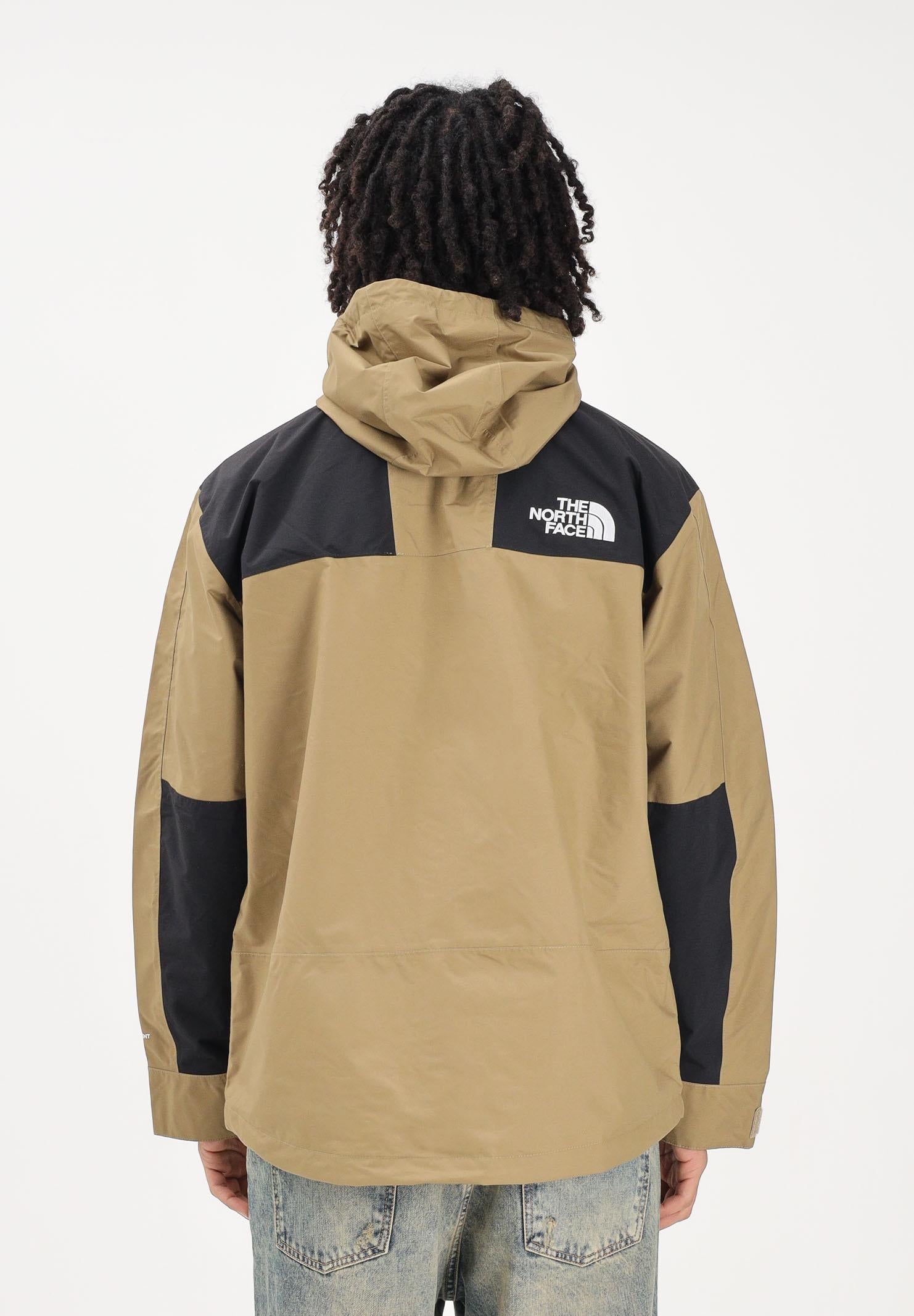 THE NORTH FACE Giacca a vento Reign On kiwi e nero da uomo NF0A8B5GKAL1 . THE NORTH FACE 
