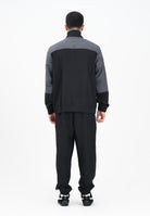 PUMA Tuta in tessuto a blocchi di colore nera e grigia da uomo 688173 01 PUMA 