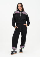 MARCELO BURLON COUNTY OF MILAN Pantalone sportivo nero da donna con stampa ali sul fondo 25ICM30074 NEPI MARCELO BURLON COUNTY OF MILAN 