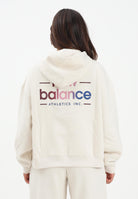 NEW BALANCE Felpa con cappuccio panna da donna rifinita da stampa logo WT53515LIN . NEW BALANCE 