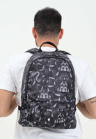 MARCELO BURLON COUNTY OF MILAN Zaino nero per uomo e donna con stampa all-over effetto pitone COMAF250111 . MARCELO BURLON COUNTY OF MILAN 