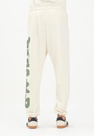DISCLAIMER Pantalone sportivo panna da uomo con stampa logo verde 25IDS55101 LAVE DISCLAIMER 
