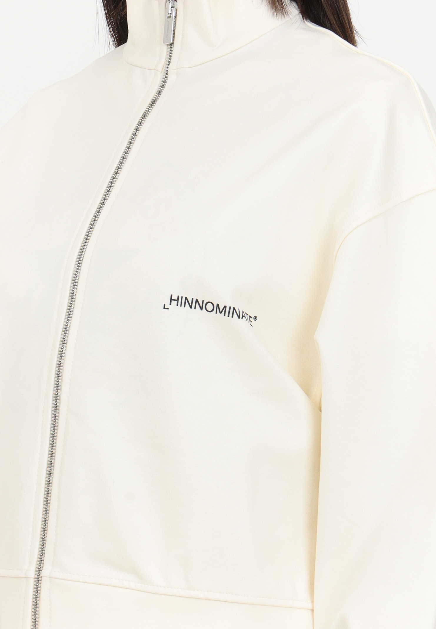 Felpa con zip colore bianco burro in tessuto tecnico da donna HINNOMINATE | HNW1219BIANCO BURRO